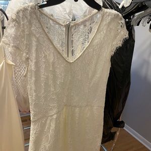 White lace dress, short and stunning . A bit sheer